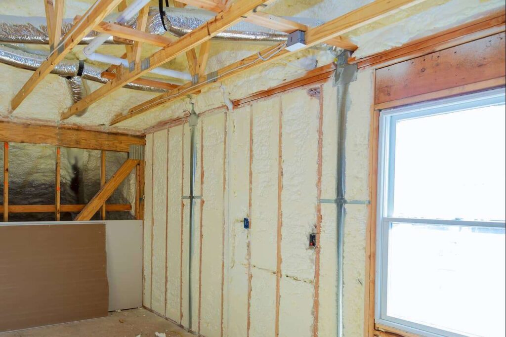 Spray Foam on Wall - Home Energy Nerds